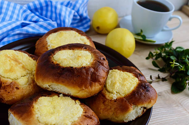 istock Vanilla cottage cheese buns (cheesecake) cup of lemon tea. 622016588
