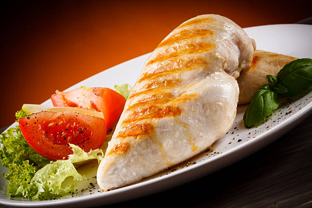 istock Roast chicken fillets and vegetables 622017172