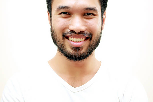 istock Asian handsome man with a mustache, smiling and laughing isolate 622017844