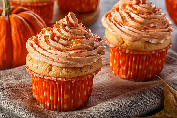istock Pumpkin cupcakes with glitter sugar sprinkles. 622018164
