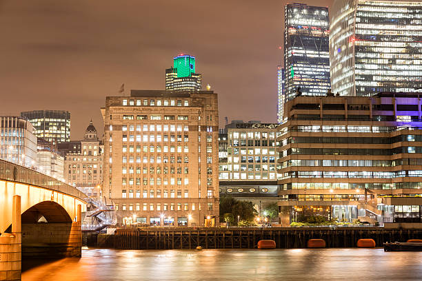 istock Illuminated Office Building at Night, London, England 622031250