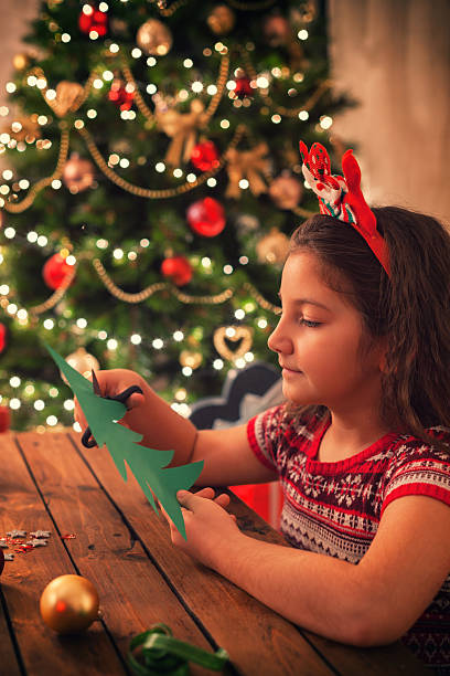 istock Little Girl Making Christmas Card 622031348