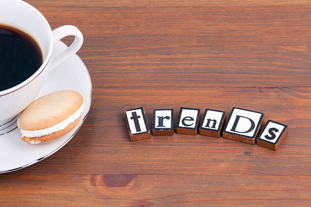 istock Coffee cup on a wooden table and text - Trends 622032164