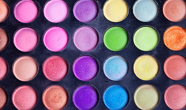 istock Make-up colorful eyeshadow palettes isolated on black background 622032278