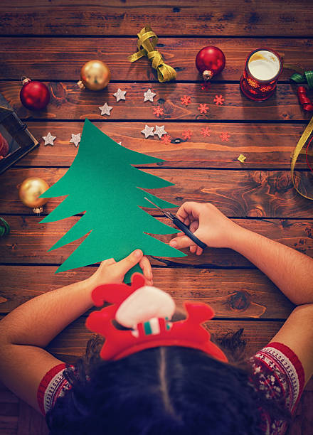 istock Little Girl Making Christmas Card 622032538