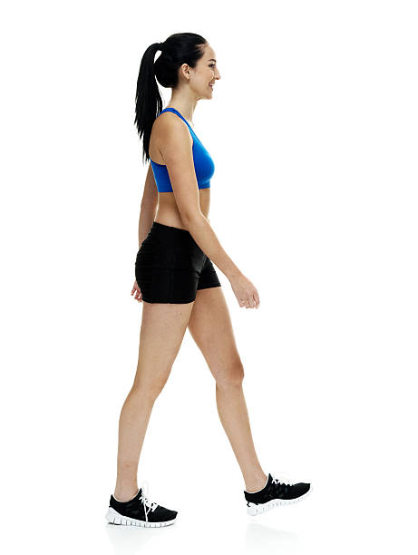 istock Smiling woman walking 622033926