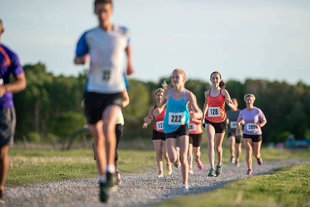 istock Young Adults Running a Race 622034028