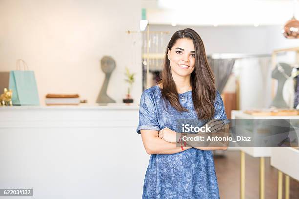 Latin Business Owner In A Jewelry Store Stock Photo - Download Image Now - Store, Jewelry, Selling