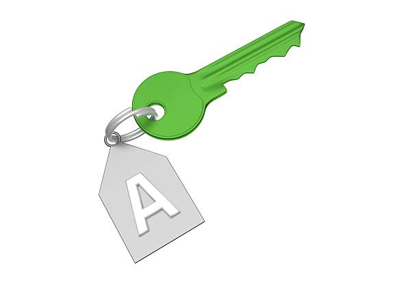 istock green key and silver trinket with silver ring 622034790