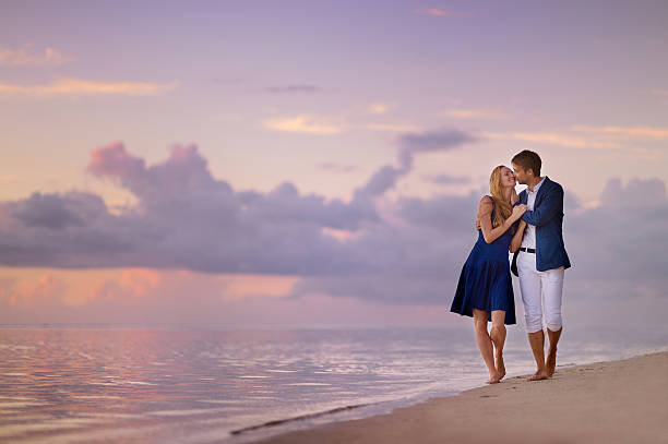 istock Beautiful romantic couple on a tropical beach 622034828