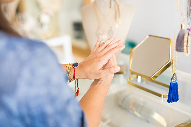 istock Woman trying on a diamond ring 622035032