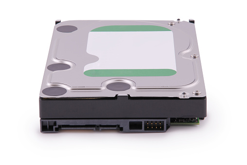 Computer hard disk isolated on white background. Clipping path inside.