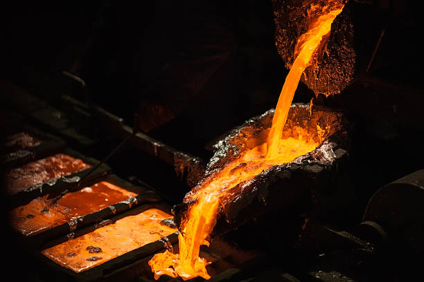 Molten metal at aluminium foundry Production of aluminium master alloys on a foundry molten stock pictures, royalty-free photos & images