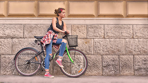istock Girl and bicycle 622037540