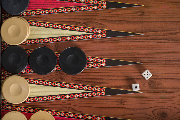 game field in a backgammon with cubes and counters. - backgammon imagens e fotografias de stock