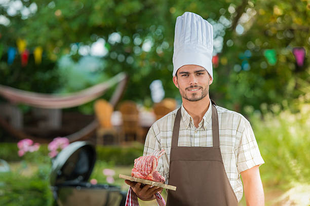 istock Handsome man preparing barbecue for friends 622039754