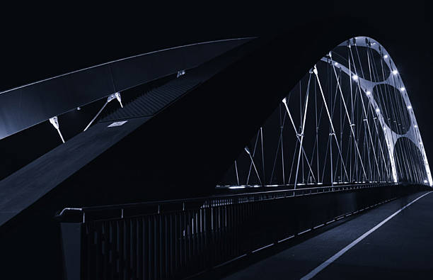 turn bridge illuminated at night.  Bridge itself is a steel construction built in the year 1905.