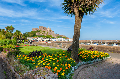 Gorey Castle and Harbour of St Martin, Jersey, Channel Islands, UK at low tide.