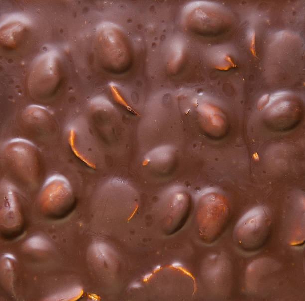 istock Texture of milk chocolate with nuts 622042116