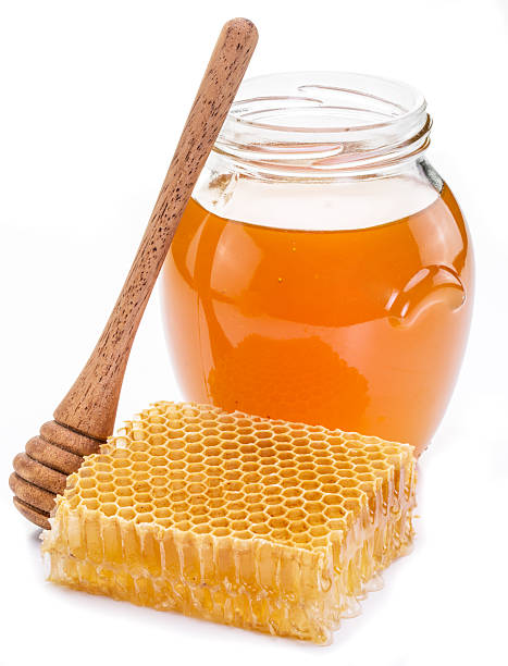 istock Jar full of fresh honey and honeycombs. 622042706