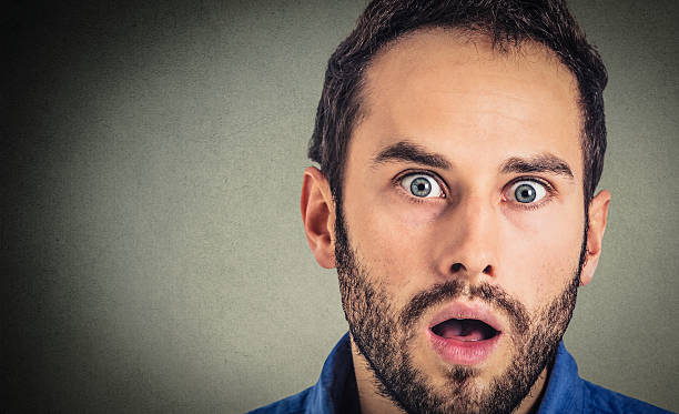 istock Closeup portrait man looking surprised 622042860