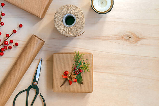 istock Christmas gift box and decorations on wooden background 622044366