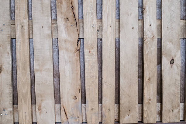 istock layer of wood plank arranged as a wall 622044492