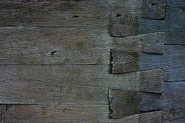 Oak planks connected in the wall corner.