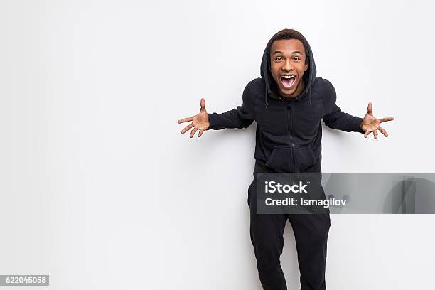 Really Happy African Guy Stock Photo - Download Image Now - Hooded Shirt, Boys, Men