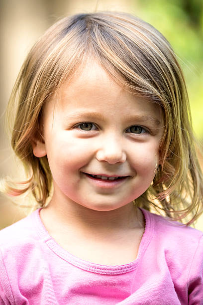 istock Little girl posing smiling 622045374