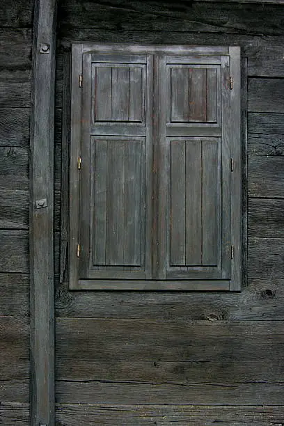 Window on the old wooden house