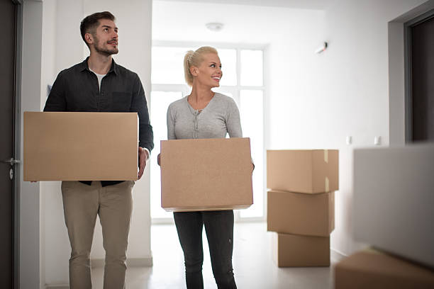 istock Couple moving into new building 622046658