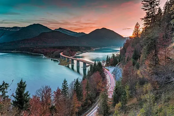 Long exposure of Sylvensteinsee at sunset in autumn