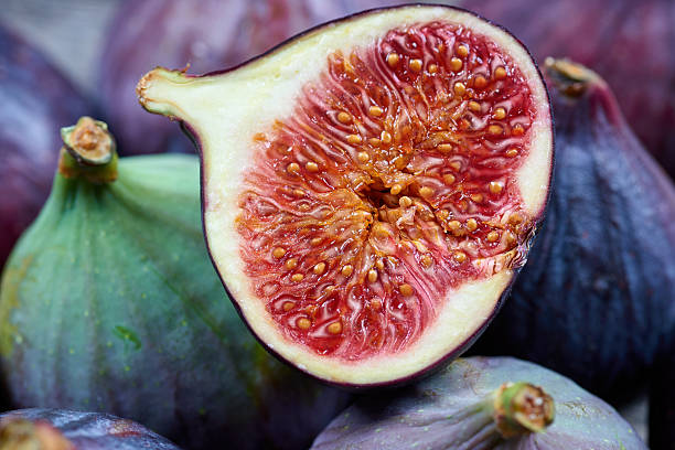 istock Fresh fig fruits on a wooden table 622047334