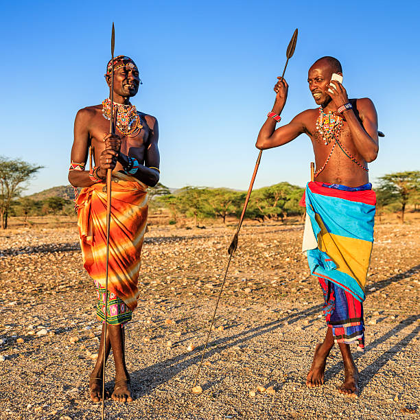 istock Samburu tribe warrior using mobile phone, central Kenya, East Africa 622048794