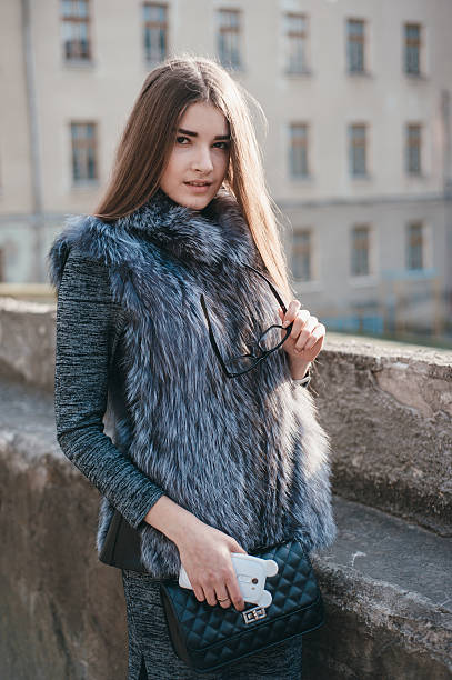 istock girl with phone 622053490