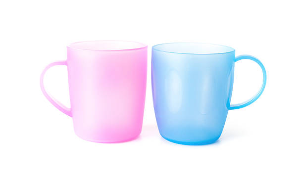 istock pink and blue plastic cups on a white background 622054396