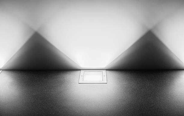 istock Modern futuristic floor light backlight. Strong, geometric shadows. 622054434