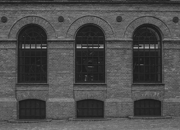istock Dark vintage brick factory wall. 622054954