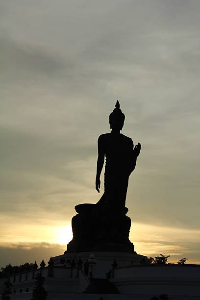 istock Shadow of big Buddha statue with evening background. 622057072