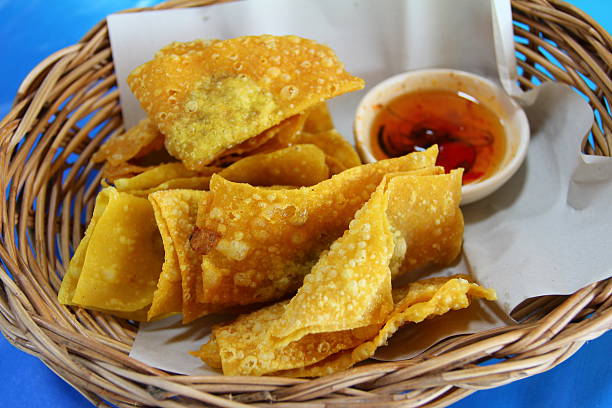istock Deep Fried Wonton on basket with plum sauce 622057100