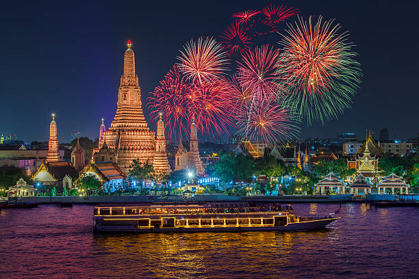 istock Wat arun and cruise ship in night time 622057582