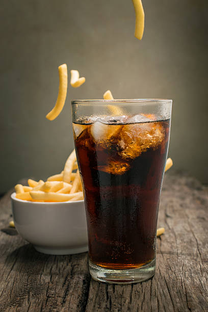 istock Cola with ice cubes Placed on wood table. 622061488