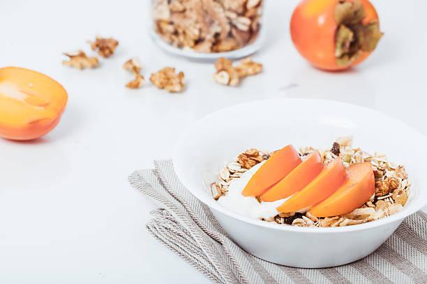Homemade vegan granola cereal with soy yogurt, walnuts, fuji app stock photo