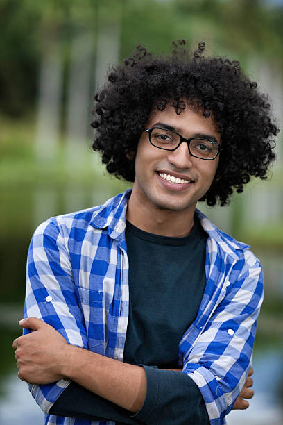 istock Young man with afro hairstyle and positive attitude 622065670