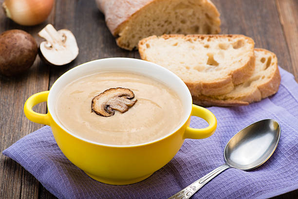 istock Mushroom cream soup on the wooden table. 622066018
