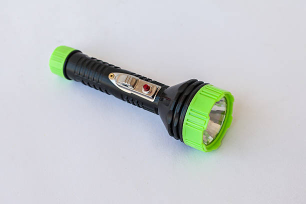 istock isolate flashlight green and black color on the white background 622066144