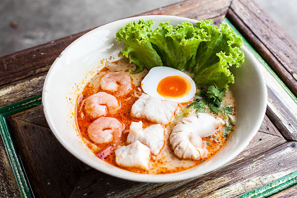 istock Tomyum noolde seafood and egg Thai food 622067390