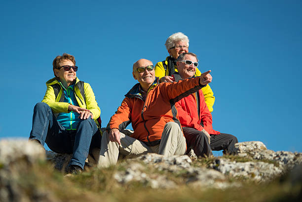 istock senior hikers looking into distance 622067684