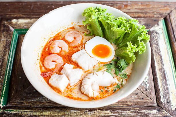 istock Tomyum noolde seafood and egg Thai food 622067848